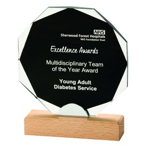 Black Crystal on a Wooden Base